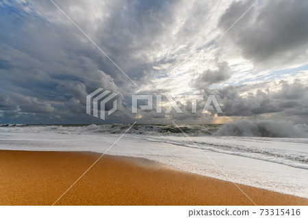 Sandy beach on the Atlantic coast in France. Sandy beach on the Atlantic coast in France. 73315416