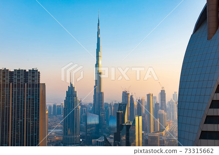 Dubai downtown skyline view at sunset 73315662