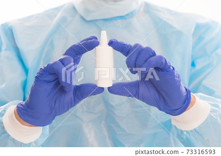 Vaccine against covid-19. Medicine container in gloves. Selective focus. Vaccine development. Vaccine against covid-19. Medicine container in gloves. Selective focus. Vaccine development. 73316593
