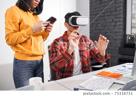 Programmer testing a new app Programmer testing a new app 73316731