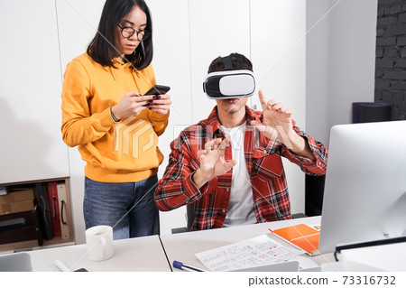 Man enjoying virtual reality experience Man enjoying virtual reality experience 73316732