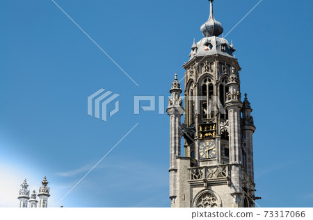 Middelburg, Netherlands, August 2019. Details of the magnificent gothic style town hall, beautiful summer day. Middelburg, Netherlands, August 2019. Details of the magnificent gothic style town hall, beautiful summer day. 73317066