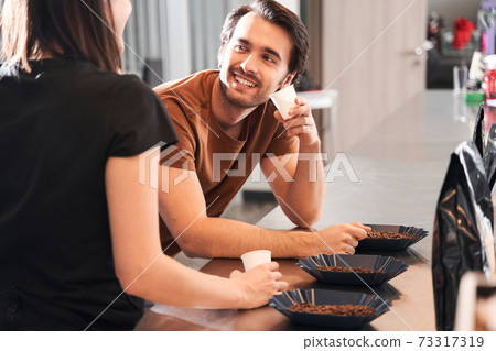 People drinking different sorts of coffee 73317319