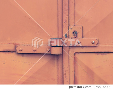 Lock case on latch and lock insert. Industrial red sheet metal doors locked Lock case on latch and lock insert. Industrial red sheet metal doors locked 73318642