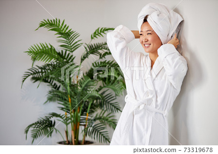 attractive mixed race woman after bathroom, wearing towel and bathrobe attractive mixed race woman after bathroom, wearing towel and bathrobe 73319678