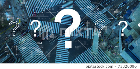 Question marks with city traffic intersection 73320090