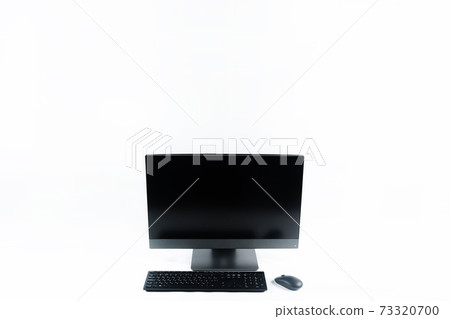 monoblock with keyboard and mouse on a white background.The computer is on white isolate 73320700