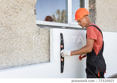 Insulation of the house with polyfoam. Insulation of the house with polyfoam. 73320925