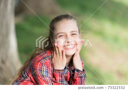 A healthy smile begins with a child. Smiling kid with white healthy smile on beautiful face. Cute small child with long blond hair and happy smile. Adorable little girl with big smile 73322532