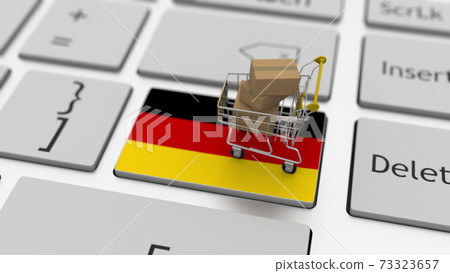 Computer keyboard key with flag of Germany and shopping cart with cartons, online shopping conceptual 3d rendering 73323657