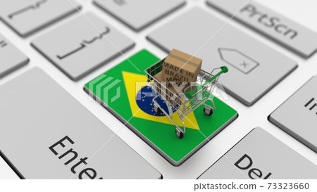 Boxes with MADE IN BRAZIL text and shopping cart on the keyboard. Conceptual 3d rendering 73323660