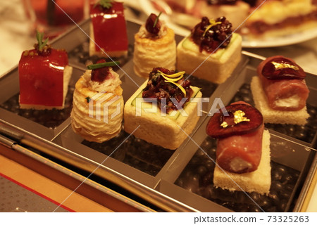 Afternoon tea cute petit cake 73325263