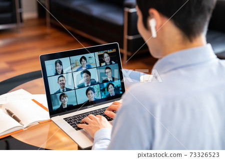 Men having an online meeting with remote work Men having an online meeting with remote work 73326523