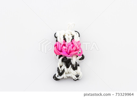 Colorful of elastic rainbow loom bands. 73329964