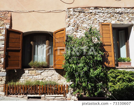 Old town of Italy House windows and plants Old town of Italy House windows and plants 73330607