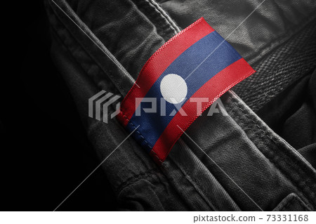 Tag on dark clothing in the form of the flag of the Laos 73331168