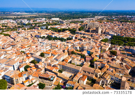 Aerial view of district of Narbonne with apartment buildings Aerial view of district of Narbonne with apartment buildings 73335178