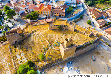 View from drone of Moorish Castle in Spanish city of Guadix, Andalusia View from drone of Moorish Castle in Spanish city of Guadix, Andalusia 73335181