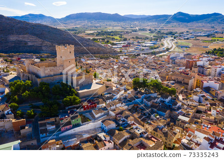 Spanish city of Villena overlooking fortified Atalaya castle 73335243