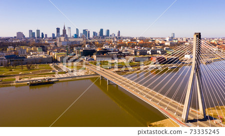 Warsaw urban landscape with Swietokrzyski Bridge Warsaw urban landscape with Swietokrzyski Bridge 73335245