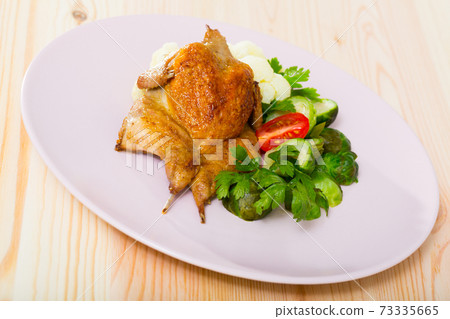Tobacco quail with steamed vegetables Tobacco quail with steamed vegetables 73335665