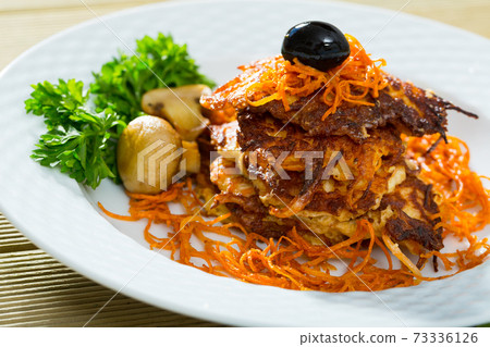 Vegetarian breakfast, fried carrot patties Vegetarian breakfast, fried carrot patties 73336126