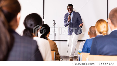 Young emotional male coach giving motivational speech Young emotional male coach giving motivational speech 73336528