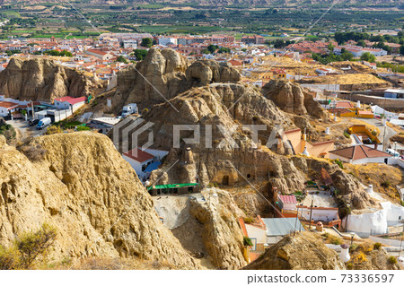 Cave houses and Rock formations. Guadix. Province Granada, Spain Cave houses and Rock formations. Guadix. Province Granada, Spain 73336597