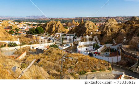 Cave houses and Rock formations. Guadix. Province Granada, Spain Cave houses and Rock formations. Guadix. Province Granada, Spain 73336612