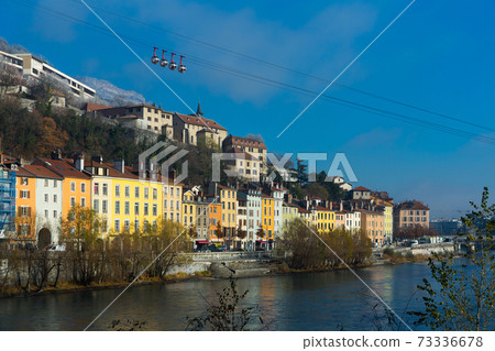 Cityscape of Grenoble with cable car to Bastille hill 73336678