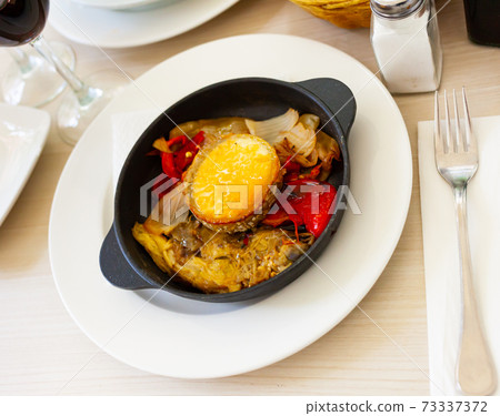 Traditional Catalan Escalivada of grilled vegetables with goat cheese Traditional Catalan Escalivada of grilled vegetables with goat cheese 73337372
