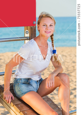 Glad sport woman is resting after training Glad sport woman is resting after training 73337725