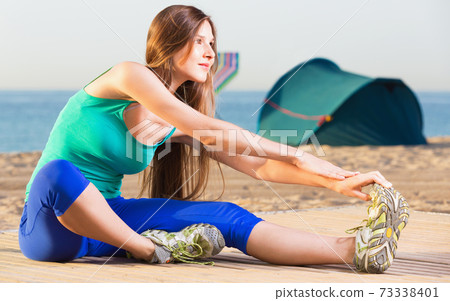 Portrait of sportswoman which is doing excercises on endurance Portrait of sportswoman which is doing excercises on endurance 73338401