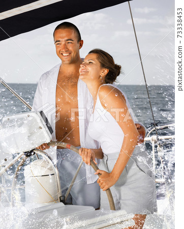 Couple steering yacht Couple steering yacht 73338453