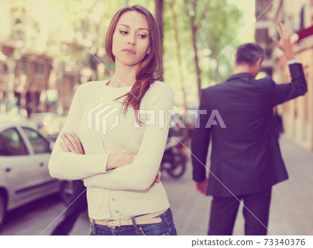 Offended girl after quarrel with boyfriend Offended girl after quarrel with boyfriend 73340376