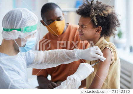African-American Boy Afraid of Vaccination African-American Boy Afraid of Vaccination 73342380