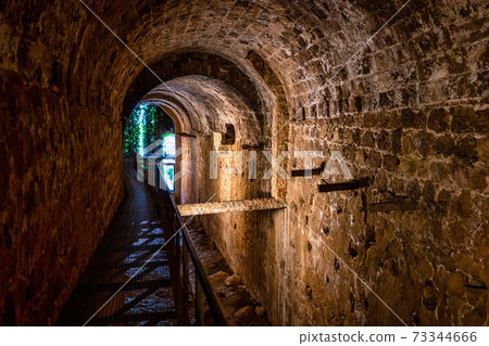 The cerezuelo river under the ruins of the church of Santa Maria, Cazorla, Spain 73344666
