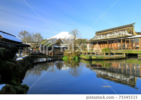 Mt. Fuji in early spring and Oshino Hakkai with residual snow, Oshino Village, Yamanashi Prefecture Mt. Fuji in early spring and Oshino Hakkai with residual snow, Oshino Village, Yamanashi Prefecture 73345515