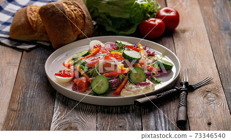 Food banner. Delicious and healthy food. Salad with smoked trout, grapefruit, fresh cucumber, purple Chinese cabbage sweet peppers. Mediterranean diet recipes. Food banner. Delicious and healthy food. Salad with smoked trout, grapefruit, fresh cucumber, purple Chinese cabbage sweet peppers. Mediterranean diet recipes. 73346540