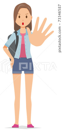 A young woman with a backpack is holding one hand A young woman with a backpack is holding one hand 73346587