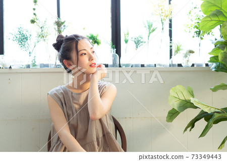 Beautiful woman doing skin care Beautiful woman doing skin care 73349443