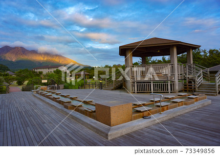A footbath at Sakurajima Lava Nagisa Park in Kagoshima Prefecture. 73349856