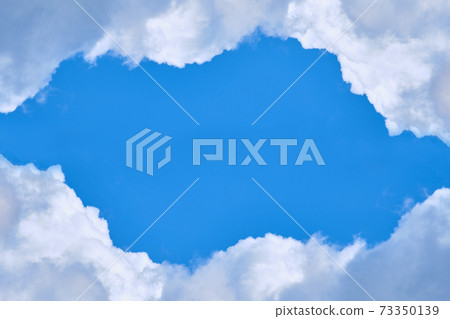 Dense clouds and blue sky and copy space. 73350139