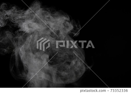 Steam, steam, steam, smoke taken on a black background 73352336