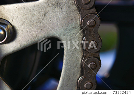 Bike dirty chain close-up 73352434