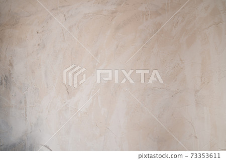 grey wall with the texture of decorative plaster. Renovation and interior design 73353611