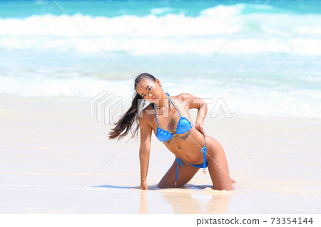 Tan on a beautiful beach Tan on a beautiful beach 73354144
