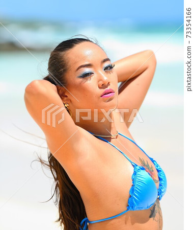 Tan on a beautiful beach 73354166
