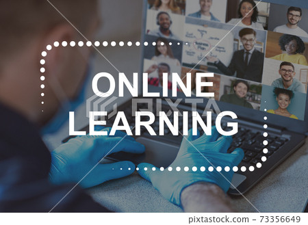Doctor in face mask and protective gloves having online learning 73356649