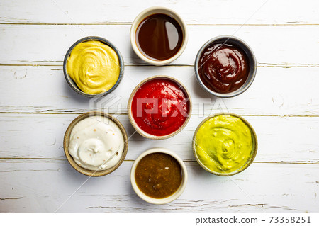 Set of different dip sauces 73358251